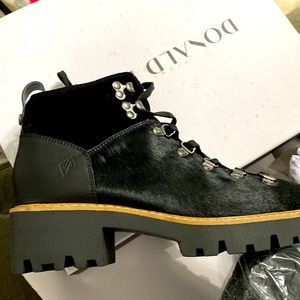 Brand new Donald pliner boots. Never been worn. Received as Christmas gift.